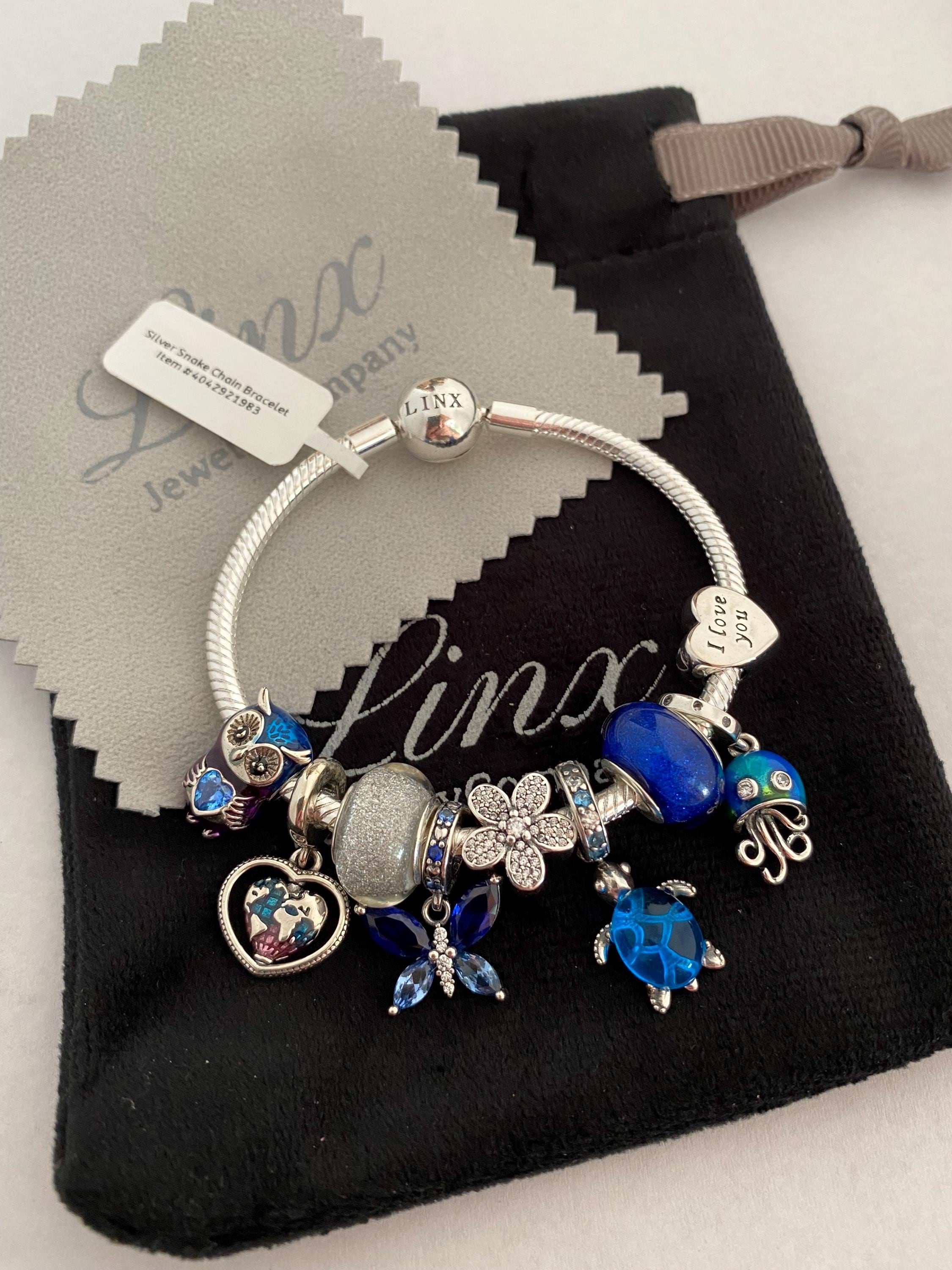 Buy Linx Silver Snake Chain Bracelet With Blue Themed Charms 925