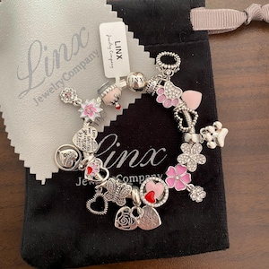 Linx Silver Snake Chain Bracelet with Pink Themed Charms