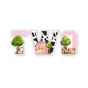May include: A decorative sign spelling out the word "TWO" with a farm theme. The letters are decorated with a cow print, pink gingham, and farm animals. A pink barn with the text "AVA'S" is in the center.