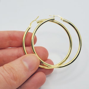 Gouden effen oorringen, modieuze glanzende sieraden grote oorringen voor dames 10 kt geelgouden grote cirkeloorbellen eenvoudige ring