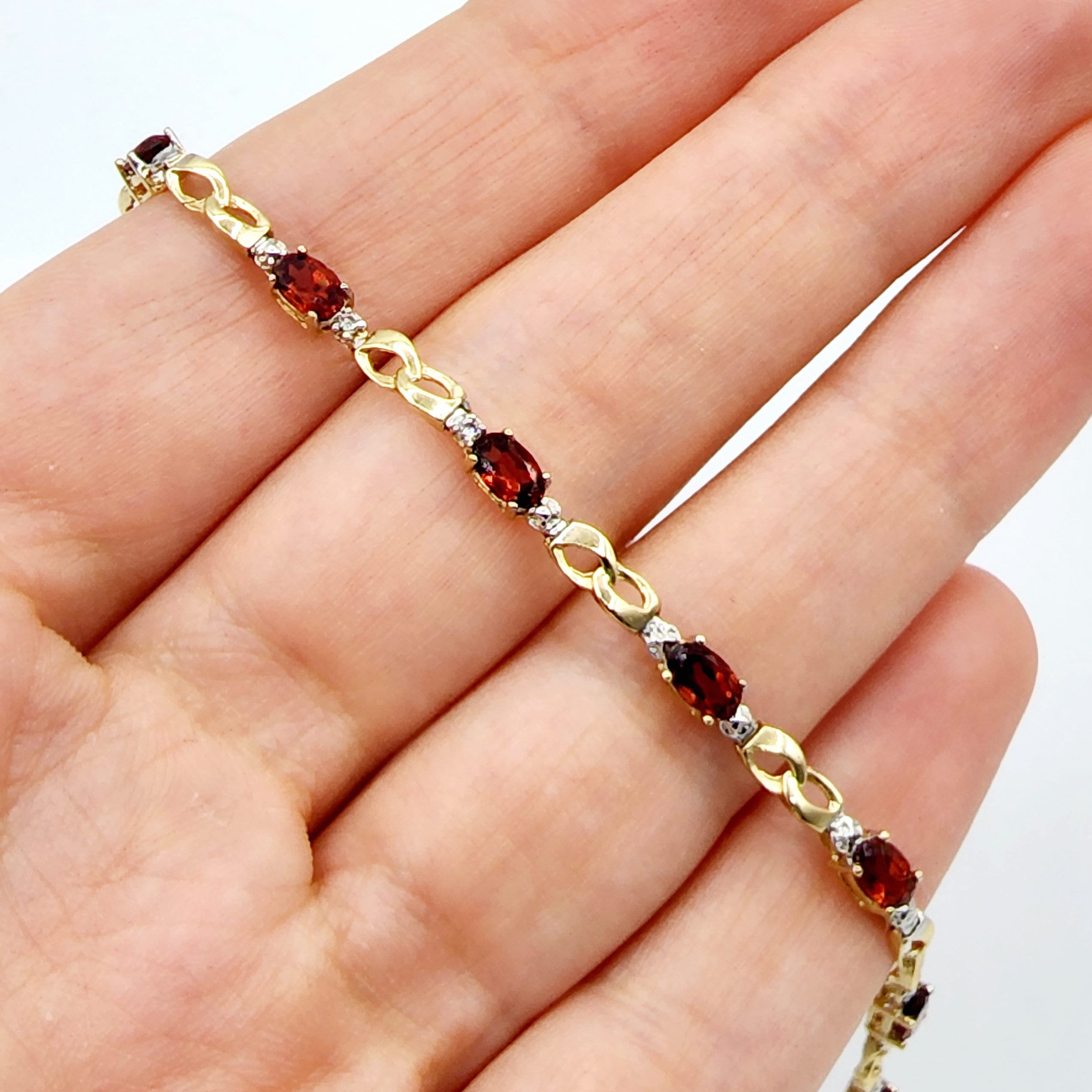 Gold and garnet best sale bracelet
