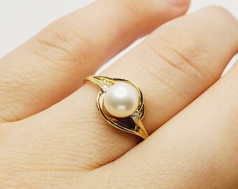 Gold mukta ring deals