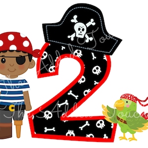 May include: A pirate-themed number two with a red border. The number is black with a pattern of white skulls and crossbones. A cartoon pirate with a red and white bandana, an eyepatch, and a blue and white striped shirt stands to the left of the number. A green parrot with a red and white bandana is to the right of the number.
