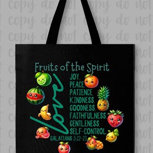 May include: Black tote bag with a green and white design featuring fruits with faces and the text "Fruits of the Spirit" with a list of virtues and the Bible verse "Galatians 5:22-23".