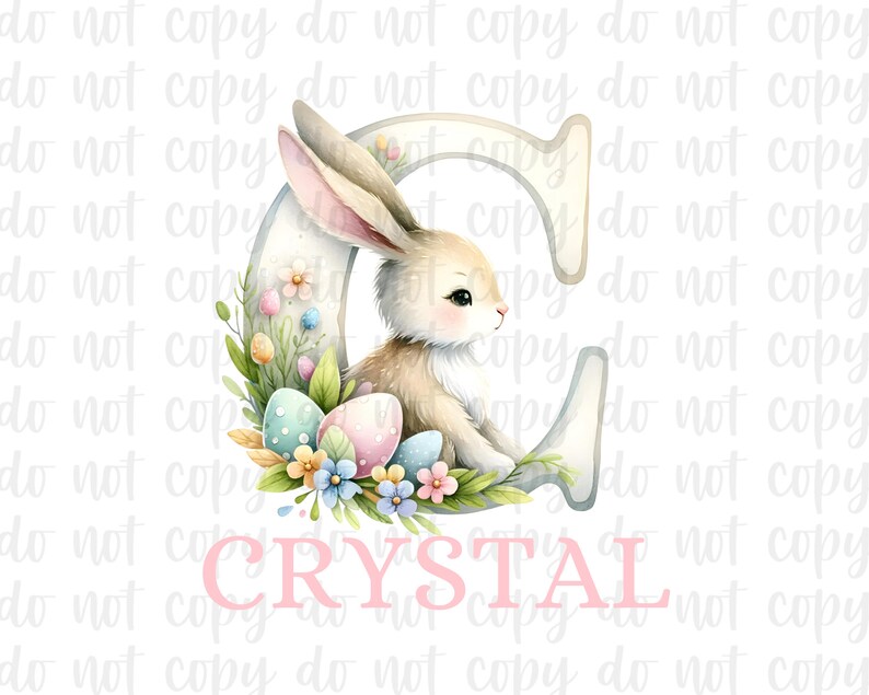 May include: A watercolor illustration of a light brown bunny rabbit sitting inside a white letter C decorated with pastel colored Easter eggs, flowers, and green leaves. The name "CRYSTAL" is written in pink below the letter.