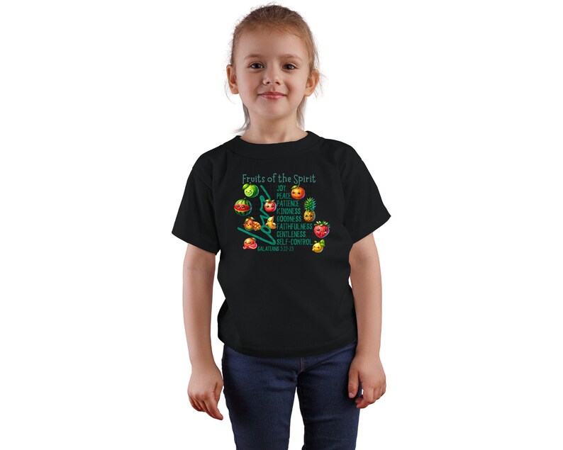 May include: A black t-shirt with a graphic of fruit and the text "Fruits of the Spirit" with a list of qualities, "Joy, Peace, Patience, Kindness, Goodness, Faithfulness, Gentleness, Self-Control", and the scripture reference "Galatians 5:22-23".
