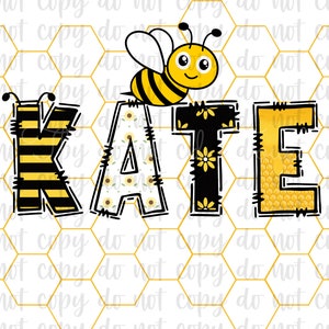 May include: A yellow and black bee with a smiling face is flying above the name "KATE" in a honeycomb pattern. The letters are decorated with yellow flowers and black stripes.
