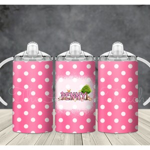 May include: Three pink and white polka dot insulated cups with lids and handles. The middle cup has the name "PENNY" in pink letters with a green tree and other pink and green designs.