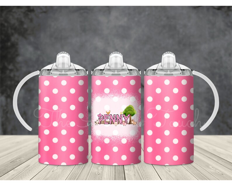 May include: Three pink and white polka dot insulated cups with lids and handles. The middle cup has the name "PENNY" in pink letters with a green tree and other pink and green designs.