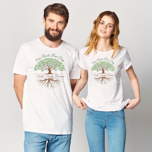 May include: Two white t-shirts with a green tree design and the text "Our Roots Run Deep" and "Smith Family Reunion".