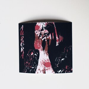 Aurora die Götter können berühren Sticker | Splatter Album Art Electro Pop Gestanzte Vinyl-Aufkleber | Handgemacht von Radical Goods