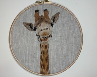 Needle felted giraffe (“painted” with wool on linen) in 8 inch hoop