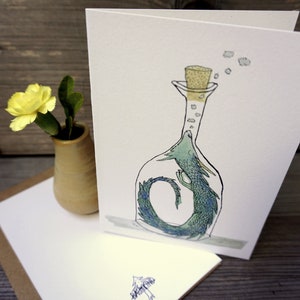 May include: A green and blue dragon is trapped inside a clear glass bottle with a cork stopper. The dragon is curled up in the bottle and has its head sticking out of the top. There are small white bubbles coming out of the bottle.
