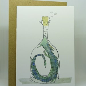 May include: A watercolor illustration of a green and blue dragon curled up inside a glass bottle with a cork stopper. The dragon's tail is curled around its body, and its head is peeking out of the top of the bottle. There are small yellow circles around the cork, representing bubbles.