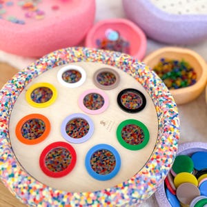 Montessori | Pannello delle attività | Blocchi impilabili | Capacità motorie fini | Sviluppo sensoriale | Sviluppo delle capacità motorie | Imparare i colori