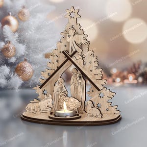 May include: A wooden Christmas nativity scene with a tree-shaped frame. The scene includes figures of Mary, Joseph, and baby Jesus, with a donkey and sheep. A lit candle sits in the center, and a star tops the tree.