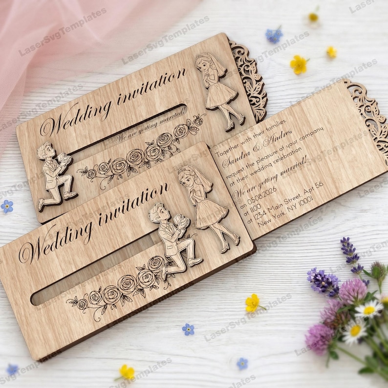 May include: Wooden wedding invitation with laser-cut design. The invitation features the words "Wedding invitation" and "We are getting married!" along with a floral design and illustrations of a couple. The invitation is open, revealing the wedding details.
