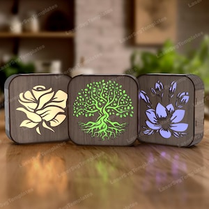Lampada da notte con fiori e alberi tagliati al laser in formato SVG. Lampada da tavolo quadrata in legno Glowforge in formato SVG. Modello DXF per lanterna in legno. Lampada da notte tagliata al laser.