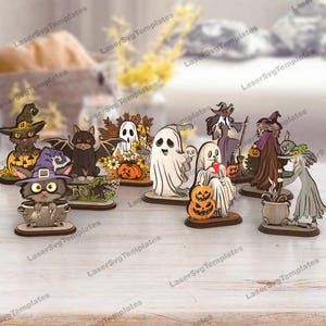 May include: A collection of Halloween-themed wooden cutouts. The set includes various figures such as cats in witch hats, bats, ghosts, witches, and pumpkins. Each figure is on a wooden base, with detailed designs and painted accents.