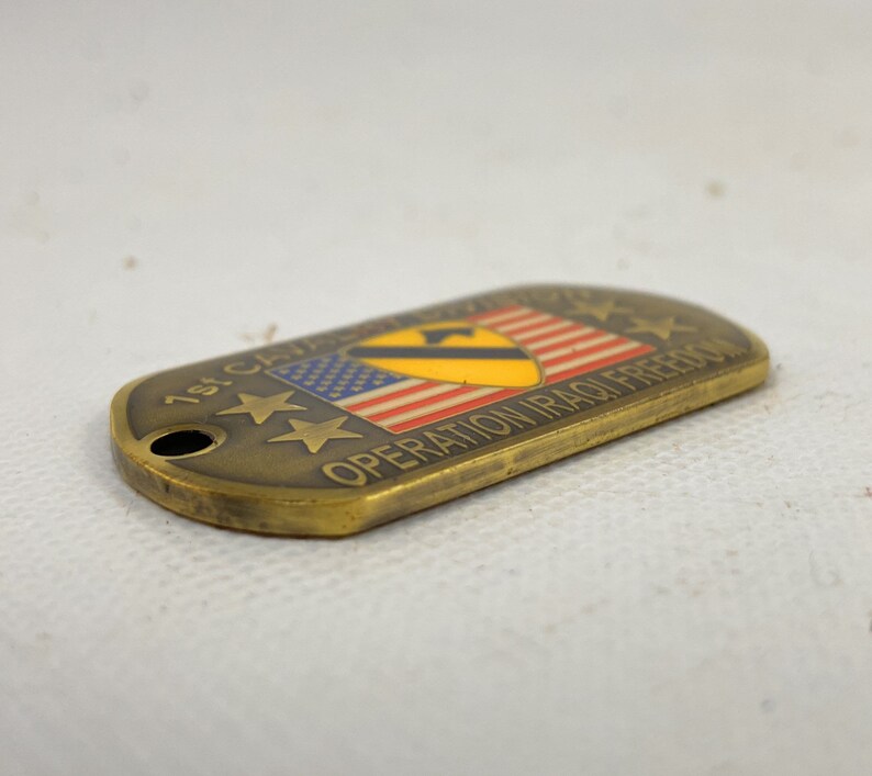 thumbnail image 2 of US Army 1st Cavalry First Team Dog Tag & Challenge Coin Medallion Set 2 of 5
