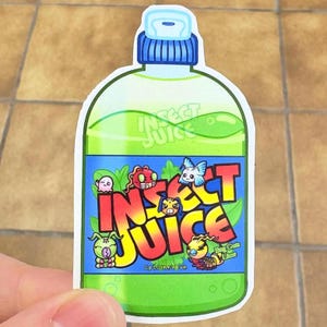 May include: A sticker depicting a cartoon bottle of "Insect Juice." The bottle is green with a blue cap and contains green liquid. The label features the words "Insect Juice" in yellow and red, along with cartoon insect characters.