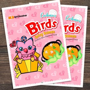 May include: A pink and yellow cartoon bird character peeks out of a yellow gift box. The box is tied with a yellow ribbon. The background is pink with white hearts. The text "Carbonara Birds Spicy Ramen Artificial Spicy Digimeat Flavor" is printed on the package.