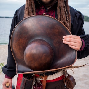 Hand stitched details on handmade pirate leather hat