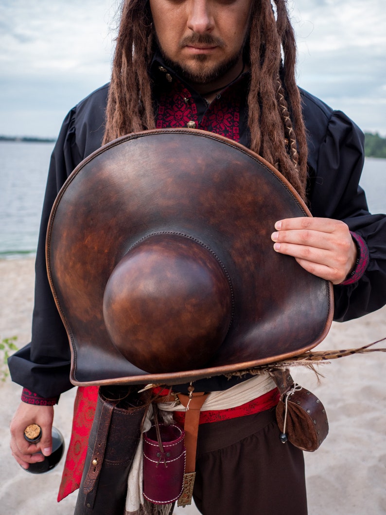 Hand stitched details on handmade pirate leather hat