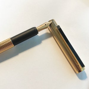 Dunhill cartridge filler gold-plated, 14K spring, as good as 1980