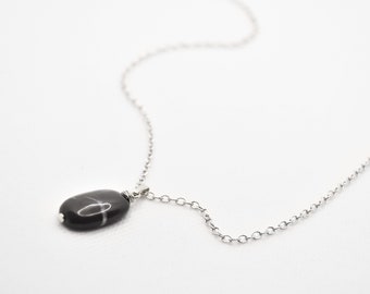 Pebble from Switzerland | Handcrafted: collected and processed by myself | with a simple silver chain