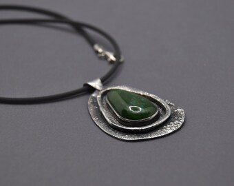 Jade from Canada | Handcrafted: collected and processed by myself | heavy silver pendant with rubber strap