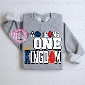 May include: Gray sweatshirt with the text "Two Teams One Kingdom" in white letters. The text is surrounded by a crown, a baseball, a football, and an arrow.