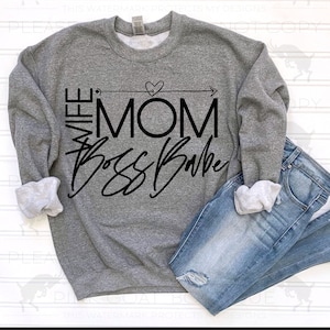 May include: Gray sweatshirt with black text that reads "Wife Mom Boss Babe" with an arrow and heart graphic.