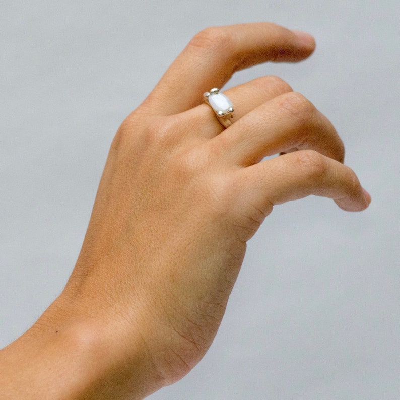 Craftmade silver ring with stone set by casting