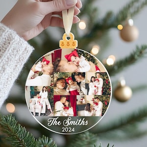 May include: A round, clear Christmas ornament with a collage of family photos. The ornament has a gold top and a white ribbon. The text "The Smiths 2024" is printed on the bottom of the ornament.