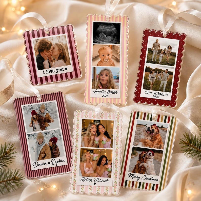 May include: Six rectangular acrylic ornaments with scalloped edges and white ribbon loops. Each features custom photo collages and text including 'I love you', 'Amelia Smith 2026', 'The Wilsons 2026', 'David & Sophia', 'Beties Forever', and 'Merry Christmas'.