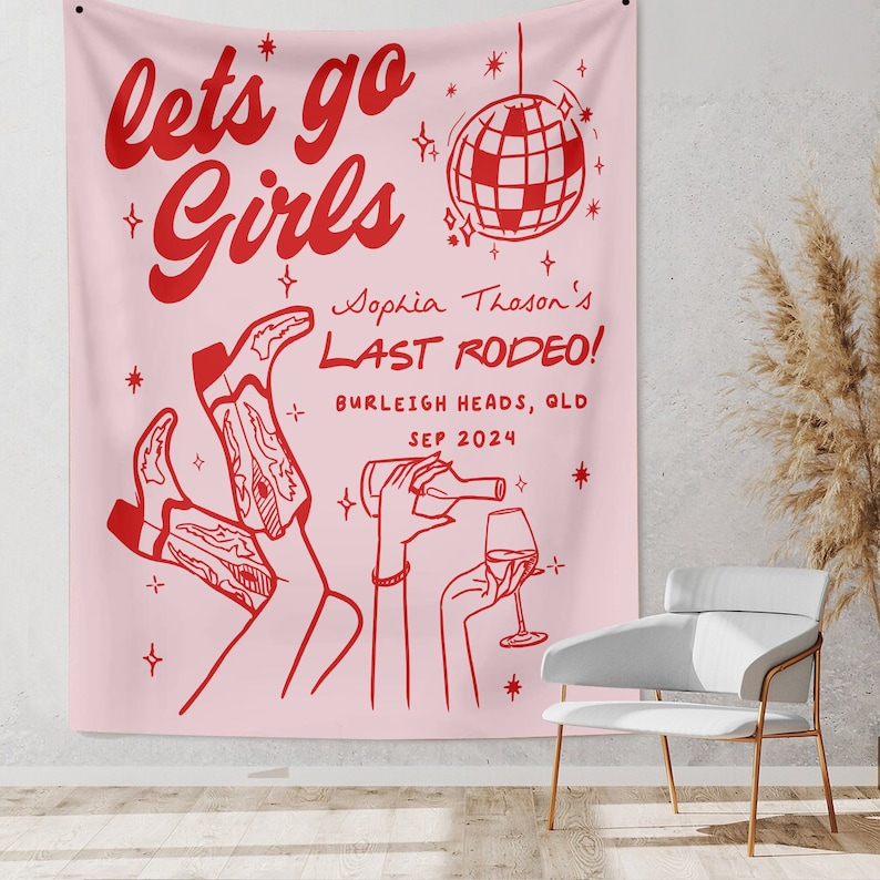 May include: Pink tapestry with red text that reads "lets go Girls Sophia Thoson's LAST RODEO! BURLEIGH HEADS, QLD SEP 2024". The tapestry also features a disco ball, cowboy boots, a wine glass, and a bottle of wine.