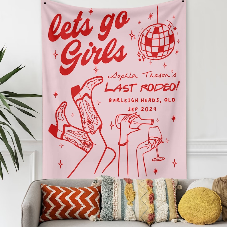 May include: Pink tapestry with the text "lets go Girls" in red. Below the text is a disco ball and the text "Sophia Thoson's LAST RODEO! BURLEIGH HEADS, QLD SEP 2024" in red.