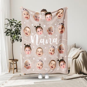 May include: A beige fleece blanket with a white heart pattern and the word "Nana" printed in white. The blanket features 16 individual photos of babies with their names printed below each photo.