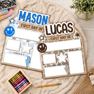 May include: Two arched wooden signs for a first day of school, one blue with the name Mason and one brown with the name Lucas. Both feature blank fields for date, age, and interests, decorated with star, lightning bolt, and smiley face icons.