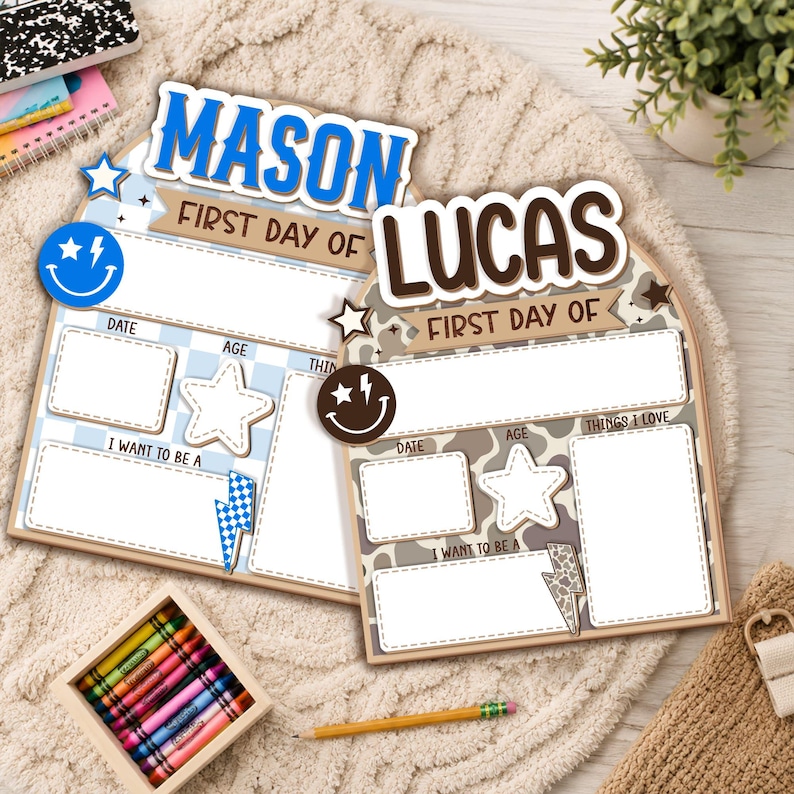May include: Two arched wooden signs for a first day of school, one blue with the name Mason and one brown with the name Lucas. Both feature blank fields for date, age, and interests, decorated with star, lightning bolt, and smiley face icons.