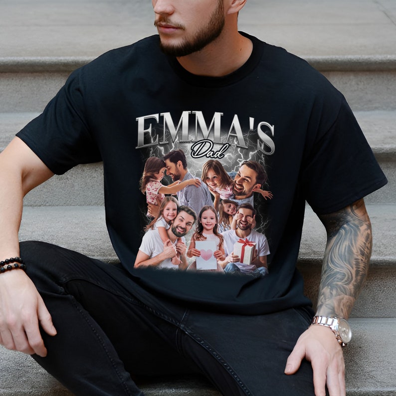 Peut inclure: T-shirt noir avec un collage de photos d'un homme et d'enfants. Le texte "EMMA'S Dad" est imprim&eacute; sur le t-shirt.