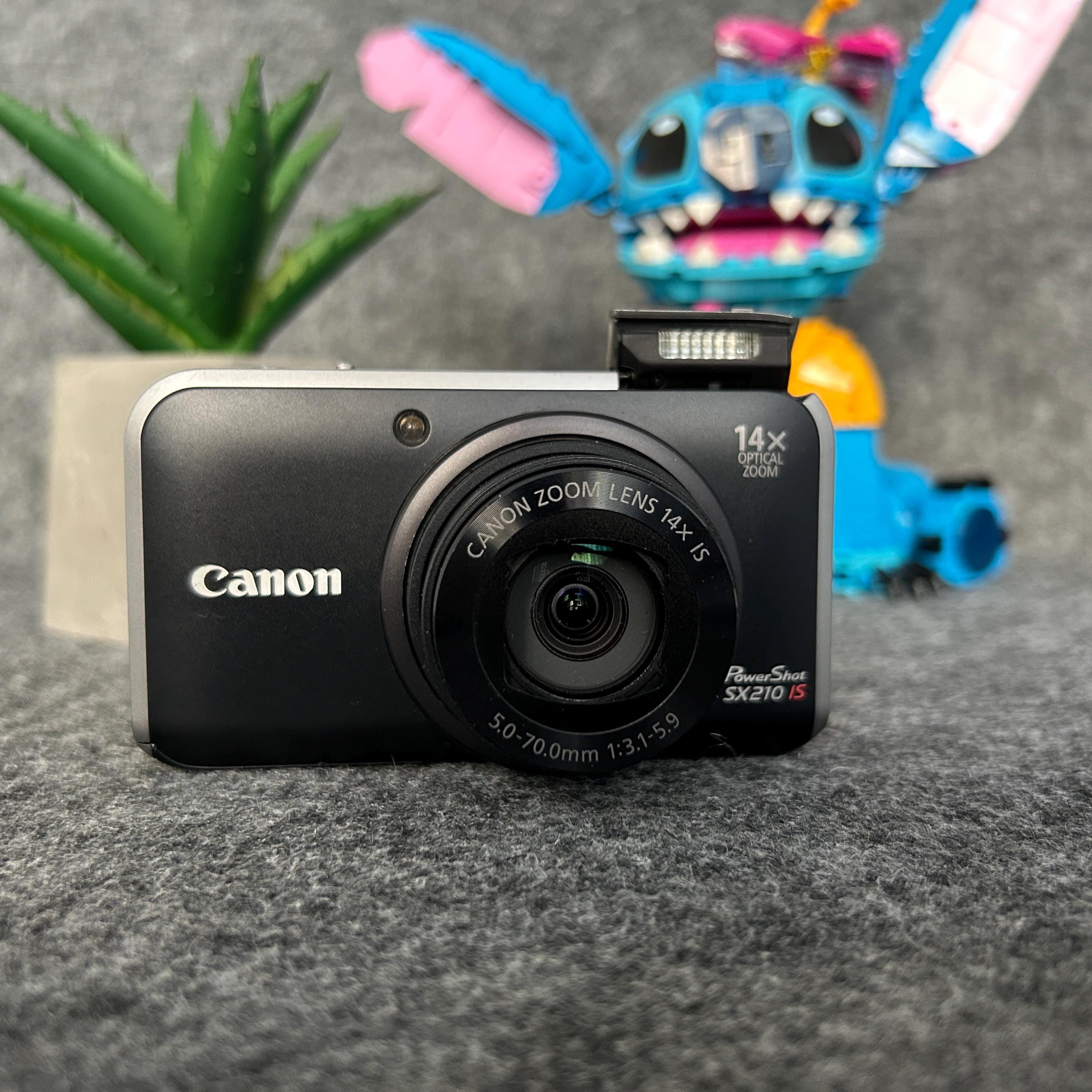 A boxed and cased Canon PowerShot SX210 IS 14mp CCD sensor compact A boxed and cased Canon PowerShot SX210 IS 14mp CCD sensor compact