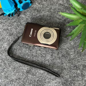 Rare Brown Canon IXUS 105 IS 12.1MP Digital Camera With Battery Charger - Tested & Working!