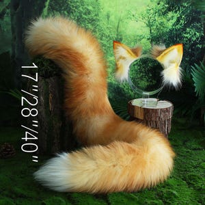 May include: A fluffy orange fox tail with a white tip, measuring 17/28/40 inches. The tail is paired with a matching fox ear headband with a yellow and white fur design.