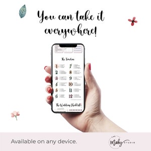 May include: A hand holding a smartphone displaying a wedding checklist app with a floral design. The app includes a timeline and checklist for wedding planning. The text on the screen reads "The Timeline" and "The Wedding Checklist".