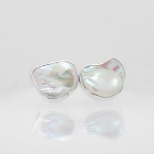 Solid Sterling Silver Cufflinks With pearls.