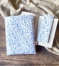 Ditsy floral book sleeve, blue padded book protector cover, book pouch, bookish gift idea, book and kindle accessories, Christmas gift product logo