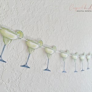 May include: A string of green margarita glasses with lime wedges, perfect for a fiesta or Cinco de Mayo party.