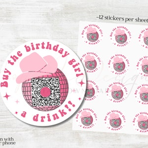 May include: A sheet of 12 pink and white round stickers with a pink cowboy hat and a disco ball with a QR code. The text on the stickers reads "Buy the birthday girl a drink!"